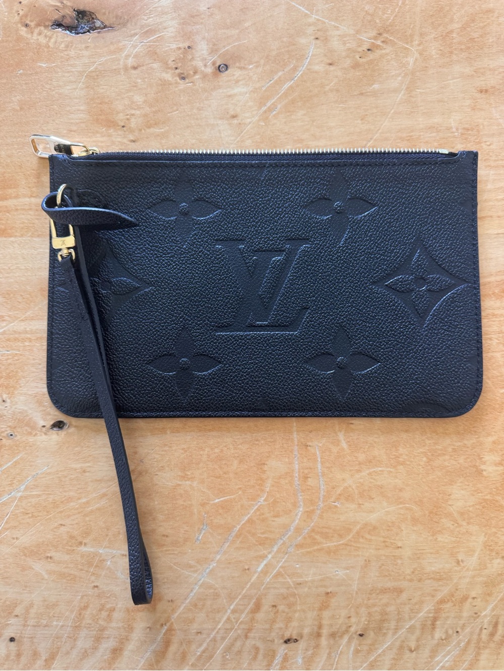 Louis Vuitton giant monogram empriente leather neverfull pochette